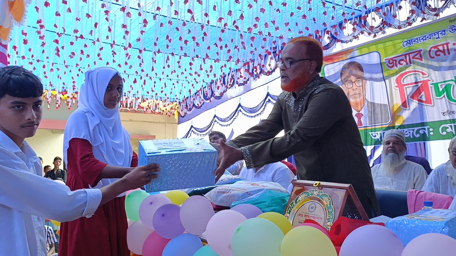 প্রধান শিক্ষক কামরুজ্জামানের অবসরজনিত বিদায় সংবর্ধনা