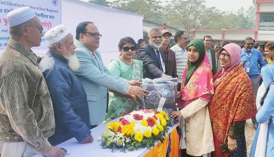 বদলগাছীতে শিক্ষার্থীদের মাঝে স্কুল ব্যাগ, শীতের পোশাক ও ল্যাপটপ বিতরণ