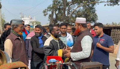 পুঠিয়াতে জামায়াত প্রার্থী মনজুর রহমানের গণসংযোগ